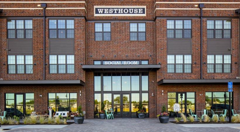 a building with windows and a sign